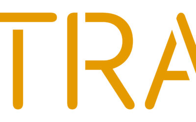 The image displays the word XTRAX in a bold, modern, yellow-orange font on a white background. The letters have sleek, clean lines with stylized X and A shapes.