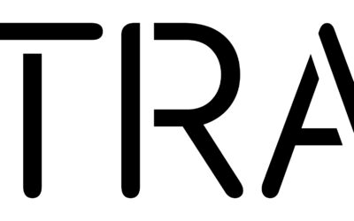 Black text logo that reads “XTRAX” in a modern, bold sans-serif font with stylized curves and lines, all letters capitalized on a white background.