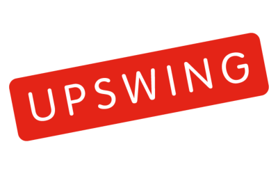 A red rectangle tilted upward contains the word UPSWING in bold, white, uppercase letters on a white background.